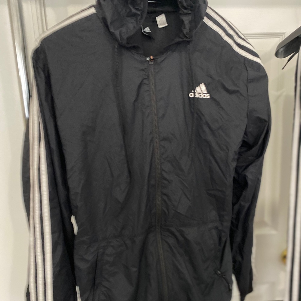 Dark blue and white ADIDAS sweat suit.